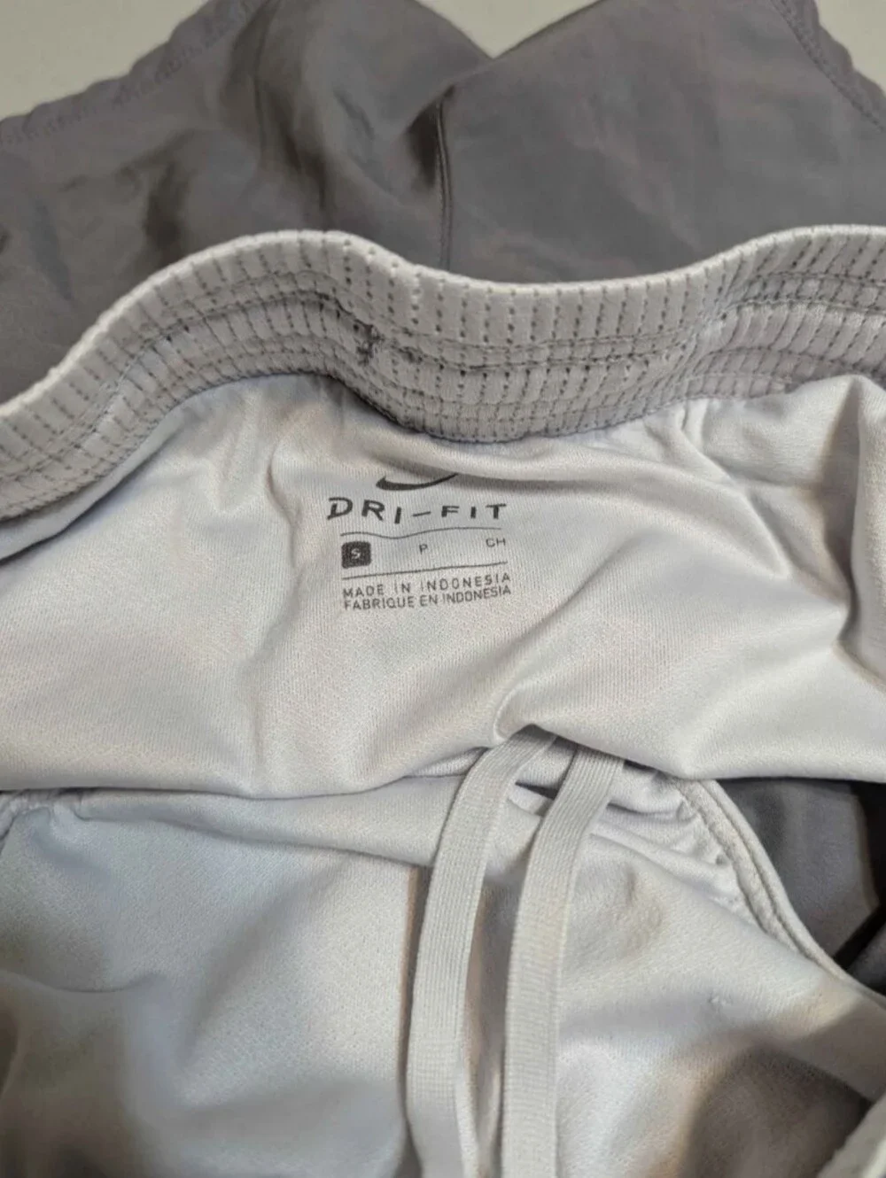 Women's small gray and white Nike shorts